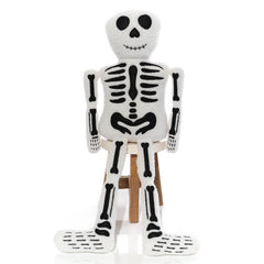 CREEPY CUTIES DANGLE LEG SITTING SKELETON